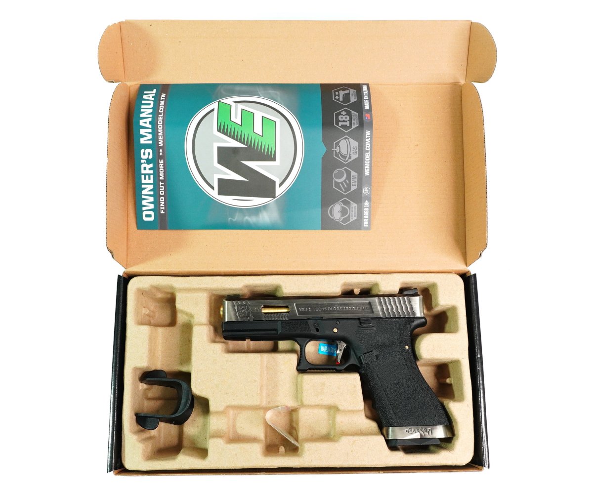 Страйкбольный пистолет WE Glock-17 G-Force, черная рамка, серебр. затвор, золот. ствол